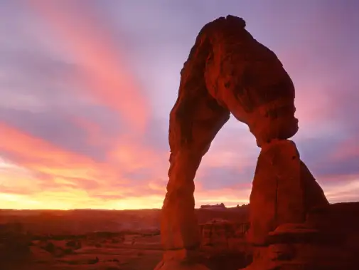 delicate-arch---sunset-clouds---large-natural-arch---october---tom-till.jpg