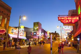 A neon lit downtown street in the US